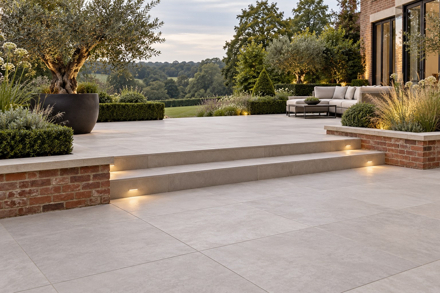 Porcelain terrace and brick garden wall inspiration